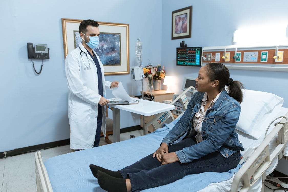 A doctor talking to a patient