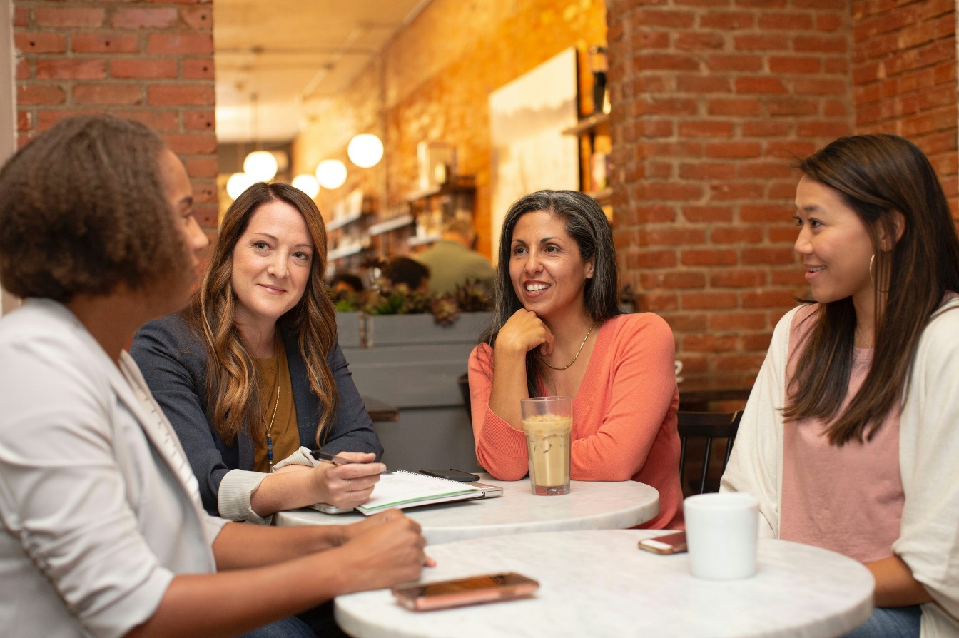 A group of people sitting at a table 