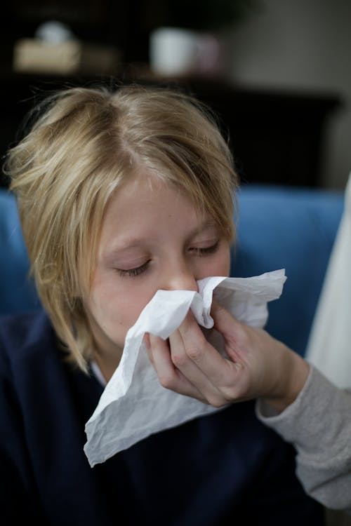 Child Wiping His Nose