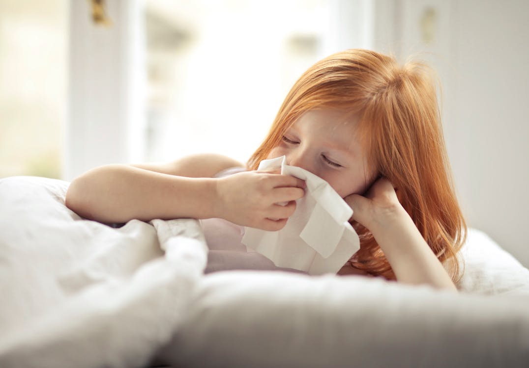 Girl Wiping Her Nose