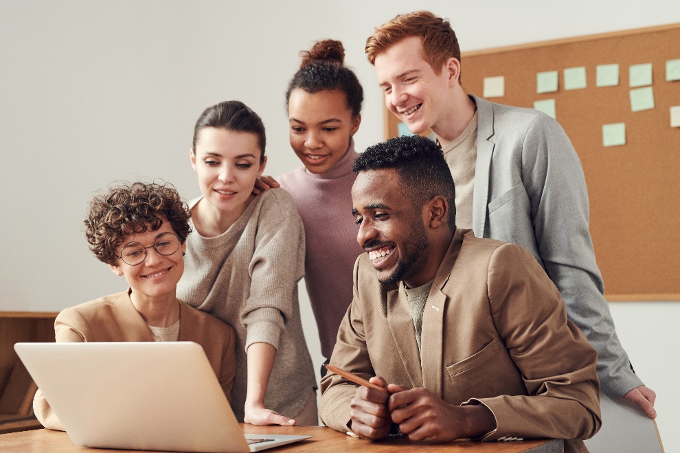 Students looking at a laptop