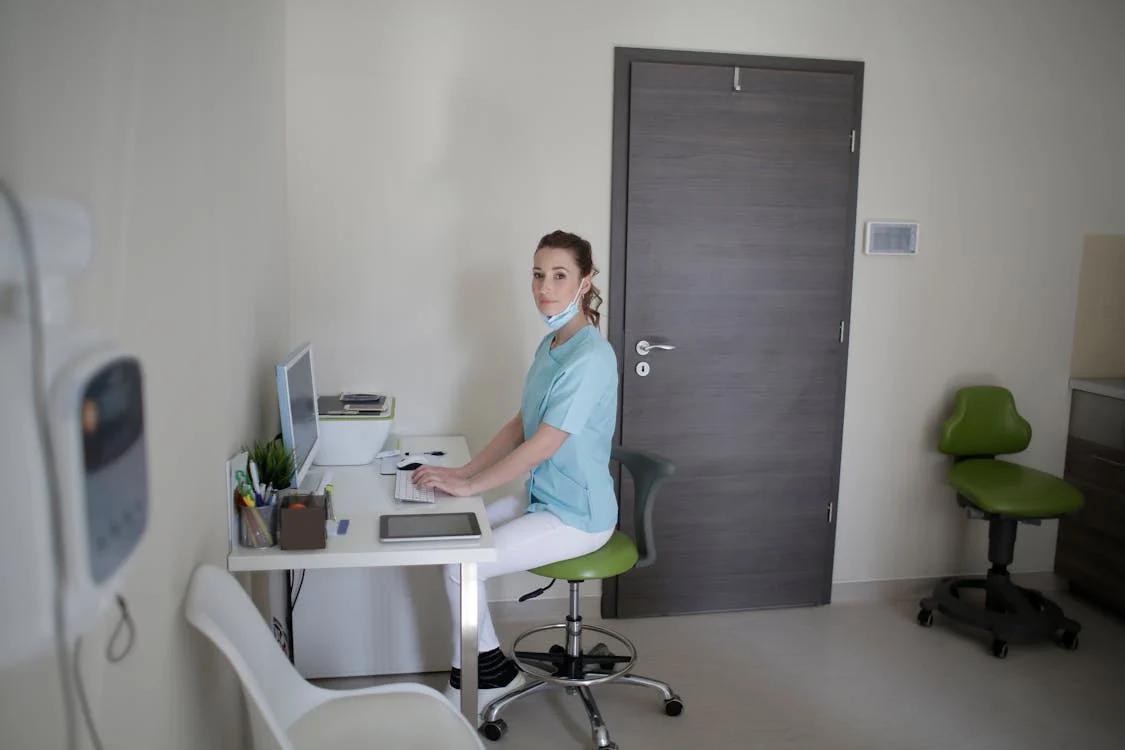 A school nurse's office with a medical chart on the desk.