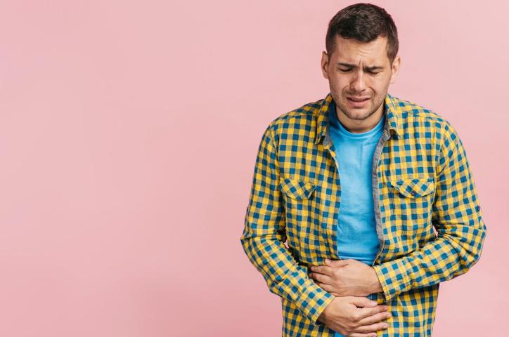 Man struggling with stomachache