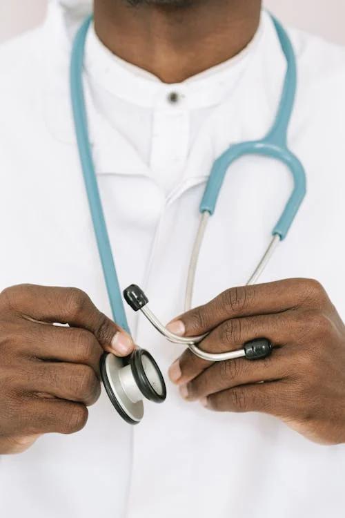 A doctor wearing a stethoscope around their neck.