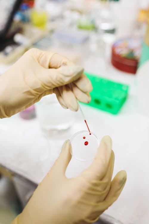 A scientist in a laboratory setting.