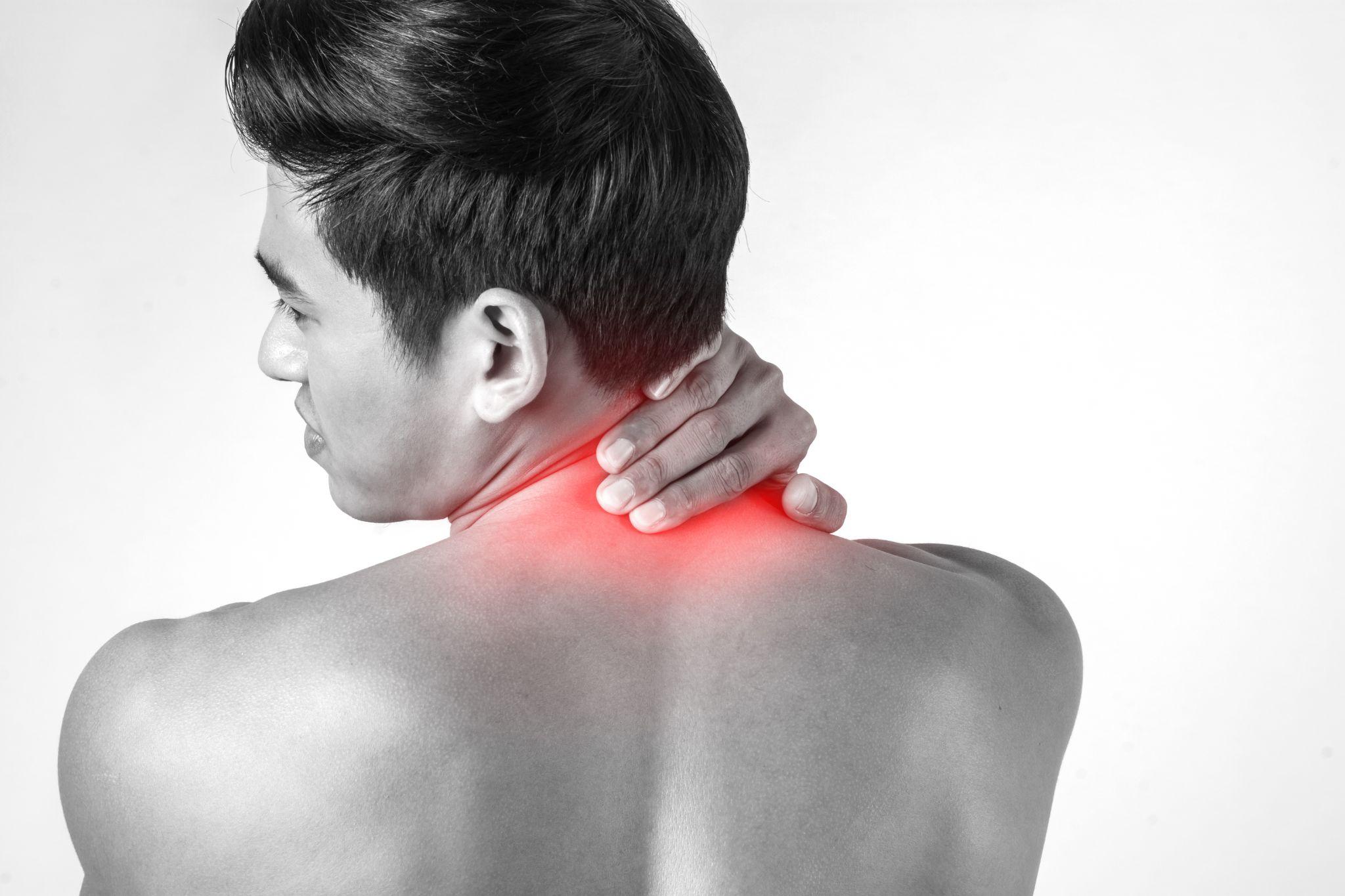 Man holding neck with pain and red highlight