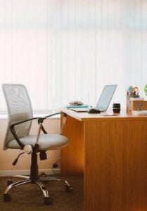 An image of an office desk and chair