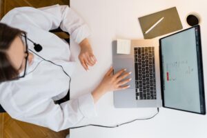 Online FMLA certification and doctor’s note service provider using a laptop 
