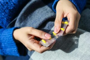 A person taking medication