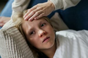 a child lying on the couch
