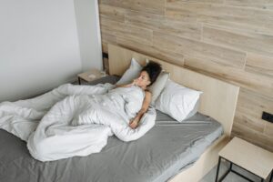 a sick woman on the bed