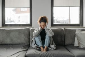 a woman sitting on a sofa
