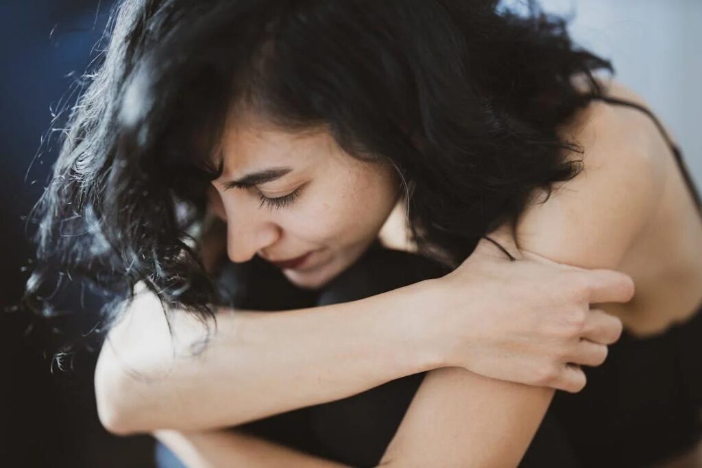 A woman suffering from musculoskeletal pain