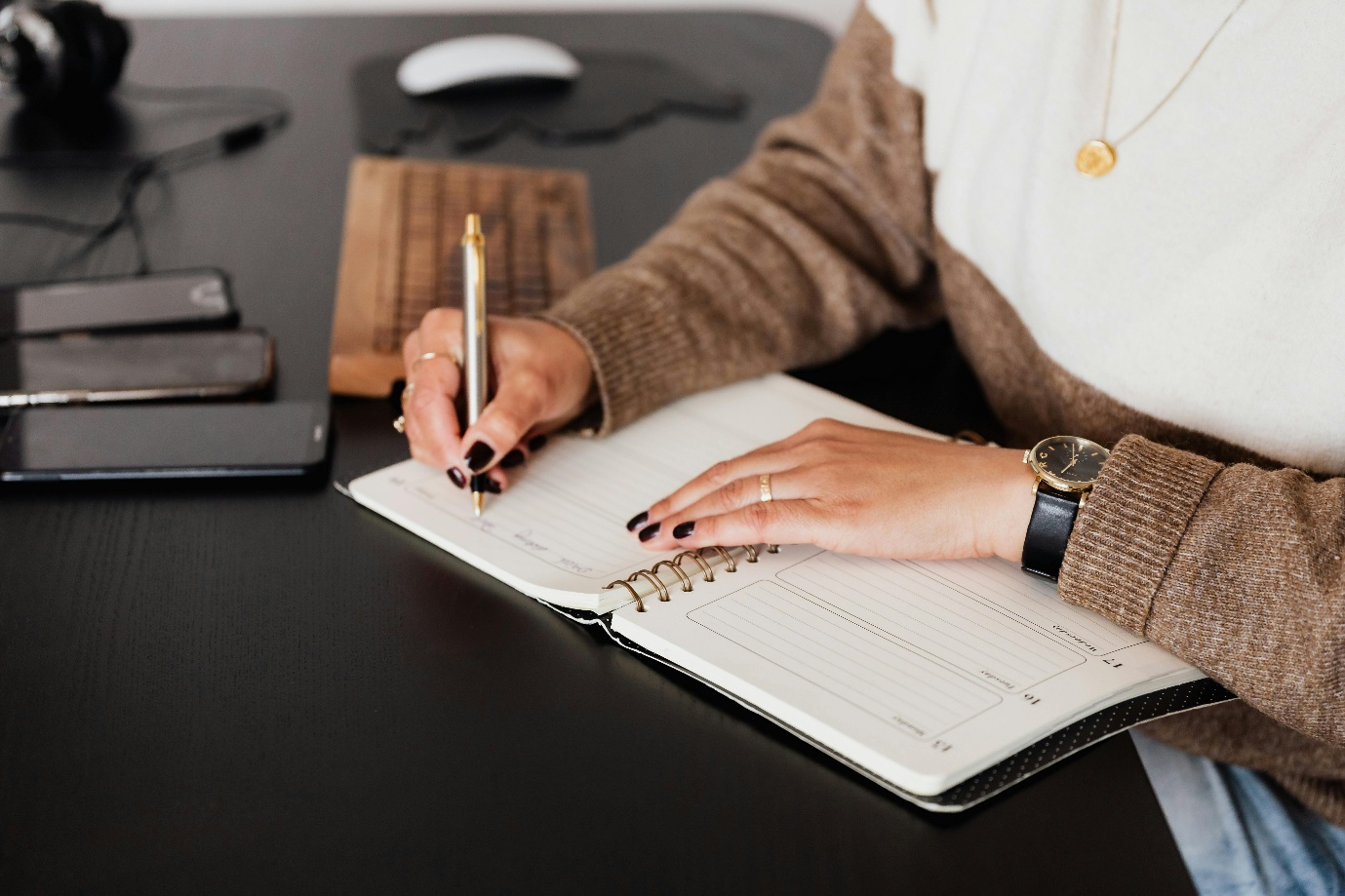 a person writing a note