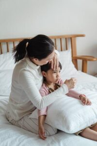 a mother looking after her child.