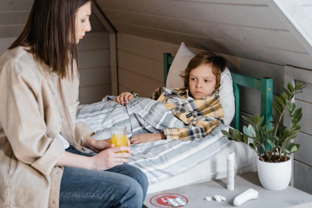 a woman with her child in bed.