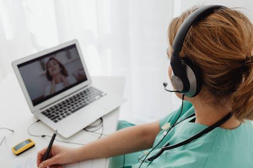 A patient having a video consultation
