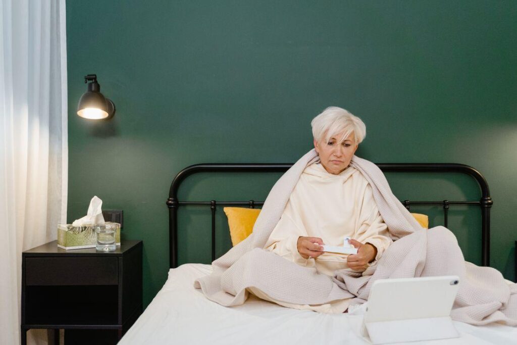 a sick woman in bed.